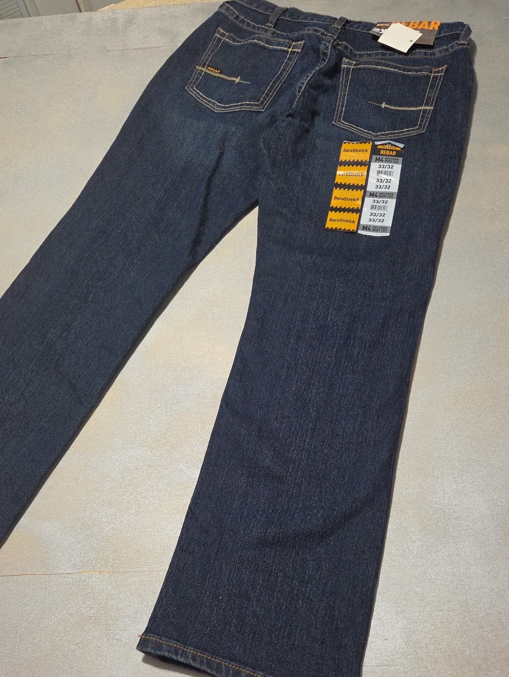 Ariat Men's Dark Indigo Bootcut Jeans with Tan Stitching